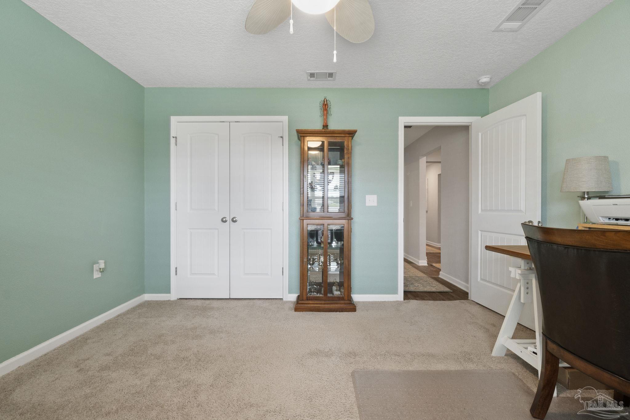 4082 Chickadee Street Milton, FL 32583 - Photo 29 of 43 a view of an empty room with window and bathroom