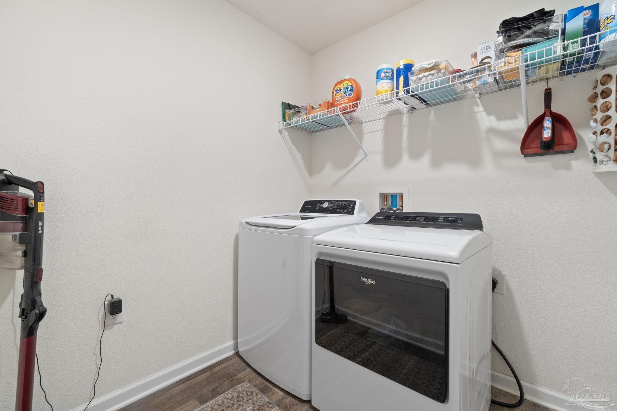 4082 Chickadee Street Milton, FL 32583 - Photo 35 of 43 a utility room with dryer and washer