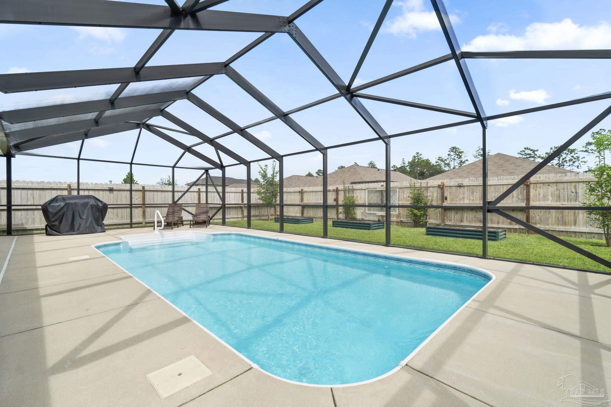 4082 Chickadee Street Milton, FL 32583 - Photo 38 of 43 a view of a indoor swimming pool