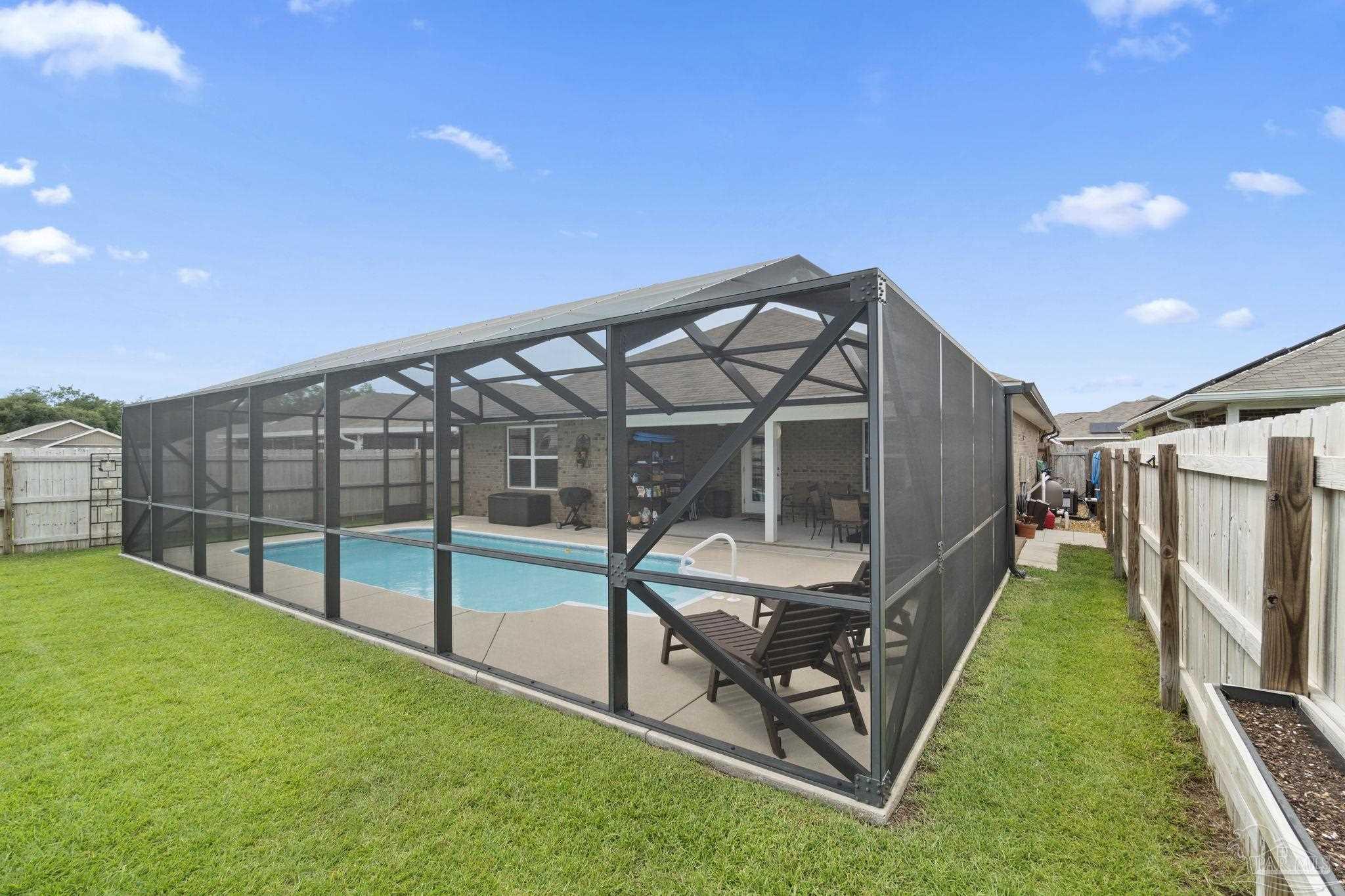 4082 Chickadee Street Milton, FL 32583 - Photo 42 of 43 a house view with a backyard space