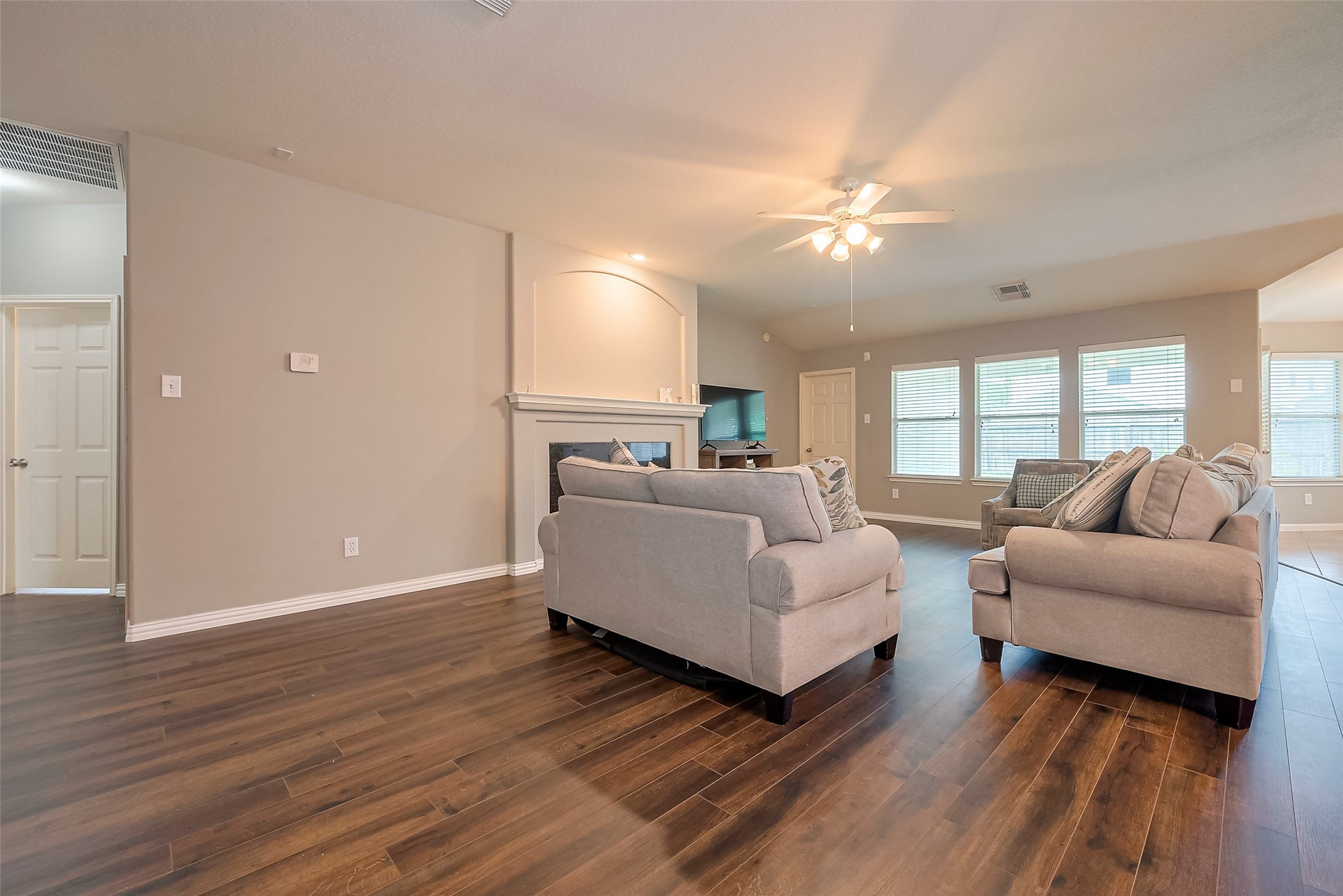 1007 Casting Springs Way Spring, TX 77373 - Photo 13 of 43 a living room with furniture and a wooden floor