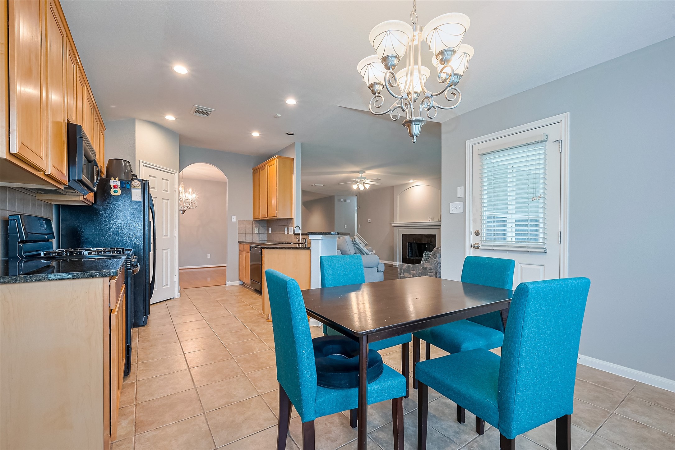 1007 Casting Springs Way Spring, TX 77373 - Photo 23 of 43 a view of a dining room with furniture