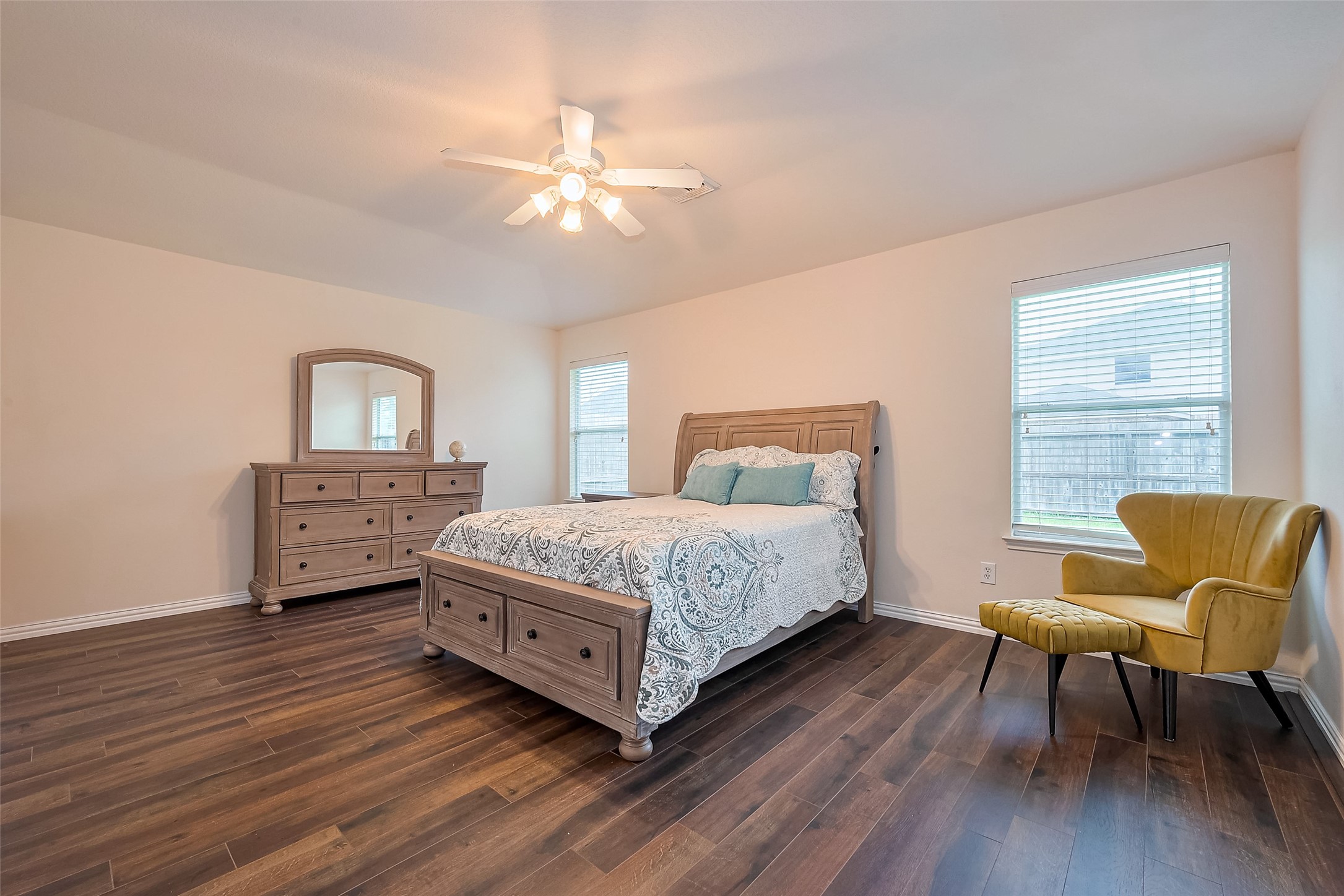 1007 Casting Springs Way Spring, TX 77373 - Photo 29 of 43 a bedroom with a bed and wooden floor