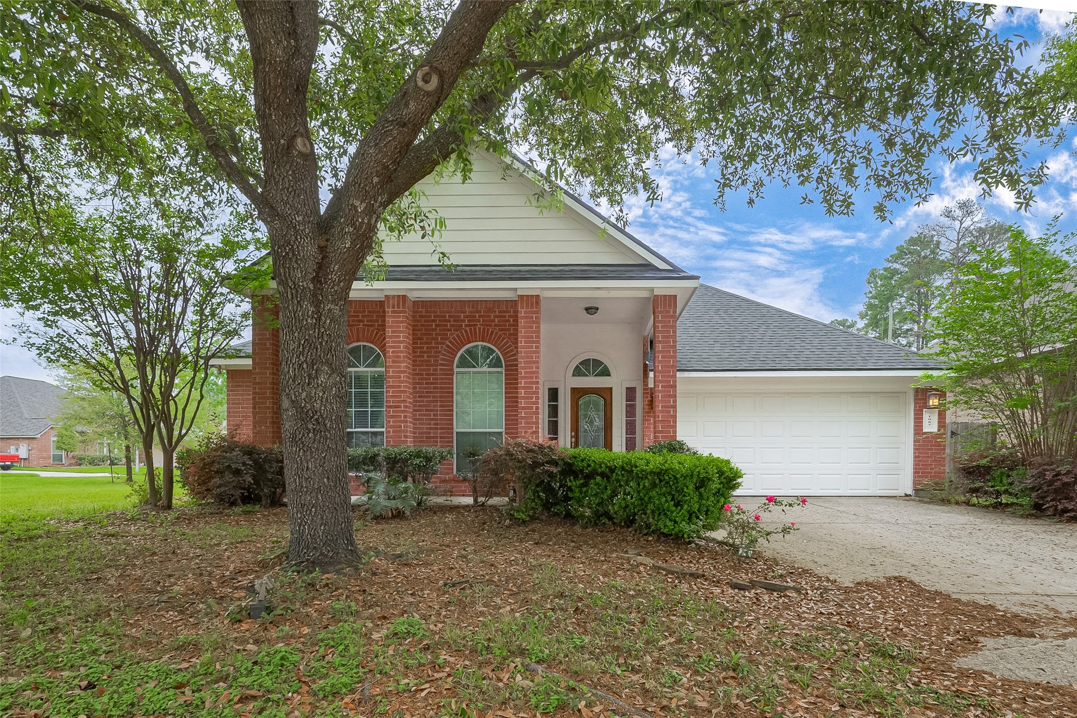 1007 Casting Springs Way Spring, TX 77373 - Photo 3 of 43 a front view of a house with garden
