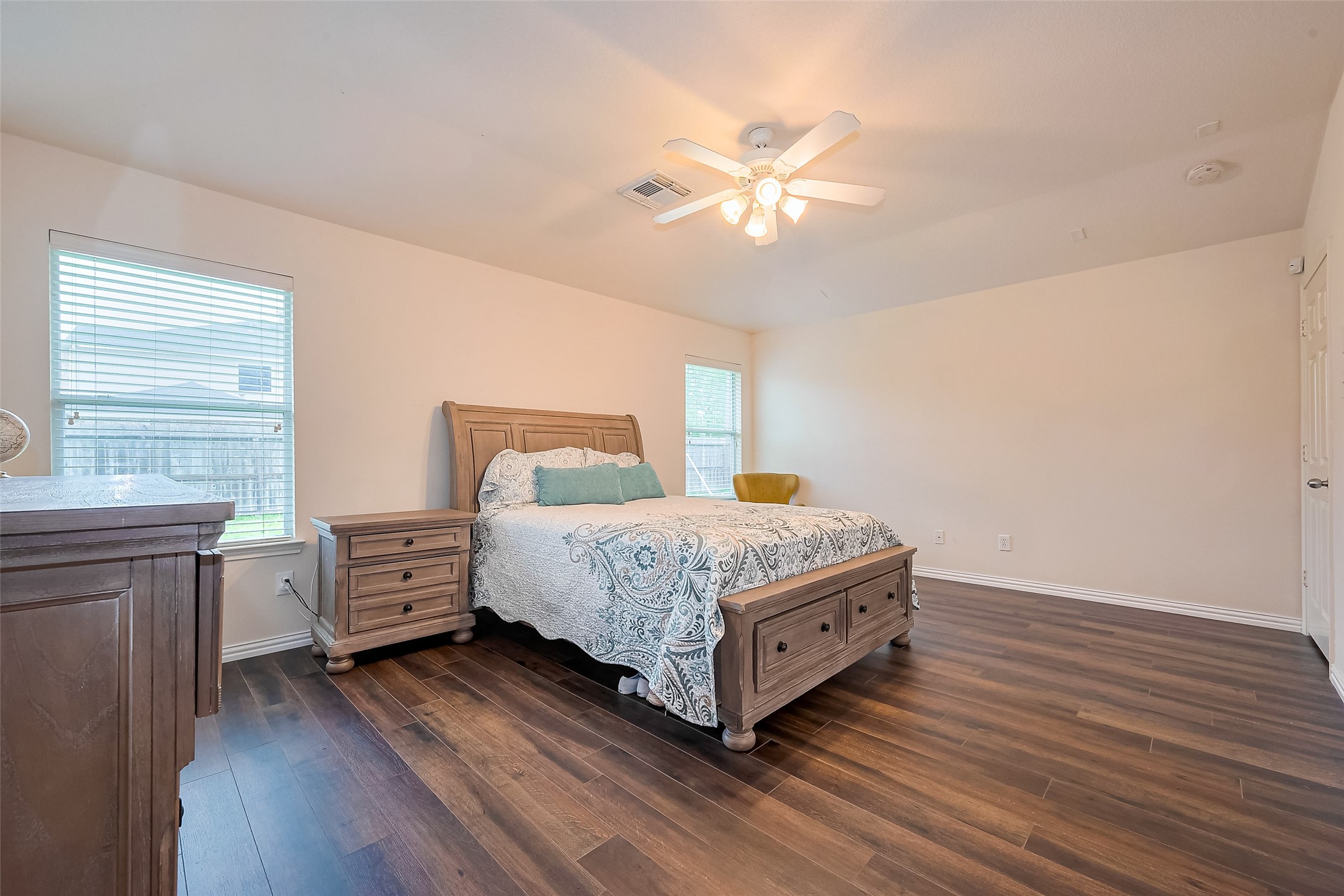 1007 Casting Springs Way Spring, TX 77373 - Photo 31 of 43 a bedroom with a bed and wooden floor