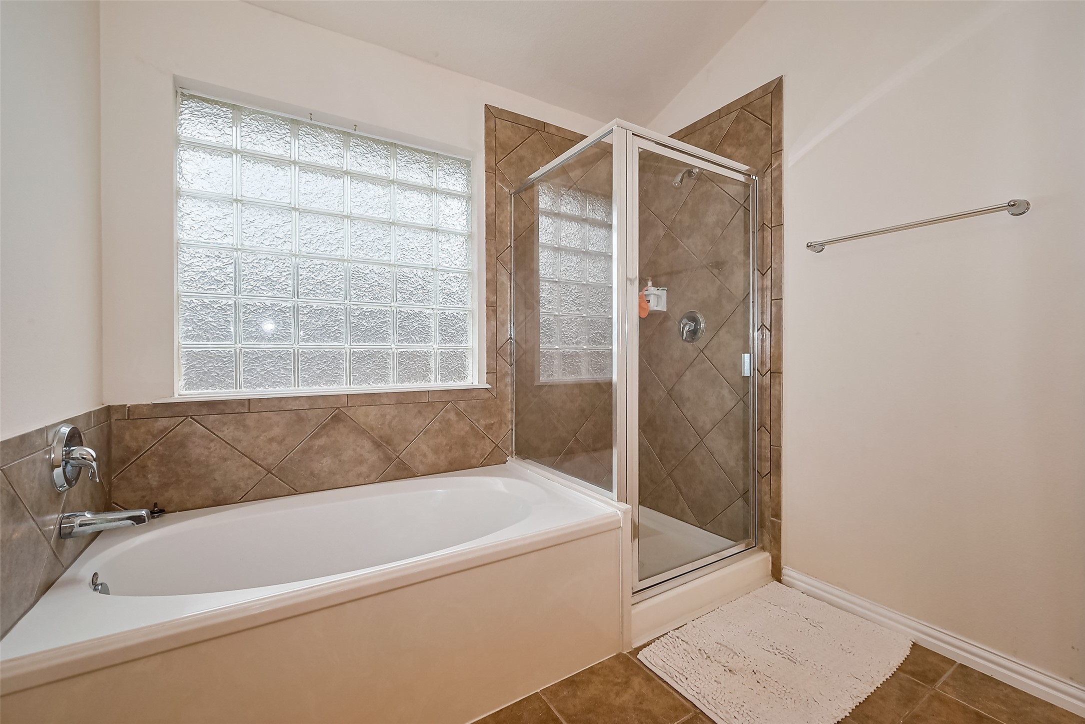 1007 Casting Springs Way Spring, TX 77373 - Photo 36 of 43 a bathroom with a bathtub and shower