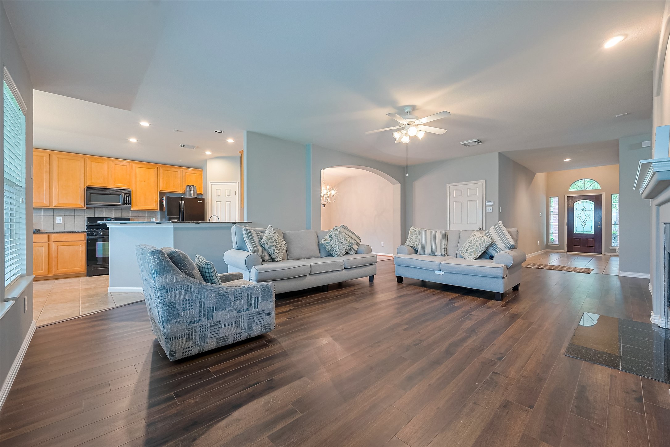 1007 Casting Springs Way Spring, TX 77373 - Photo 4 of 43 a living room with furniture and a wooden floor