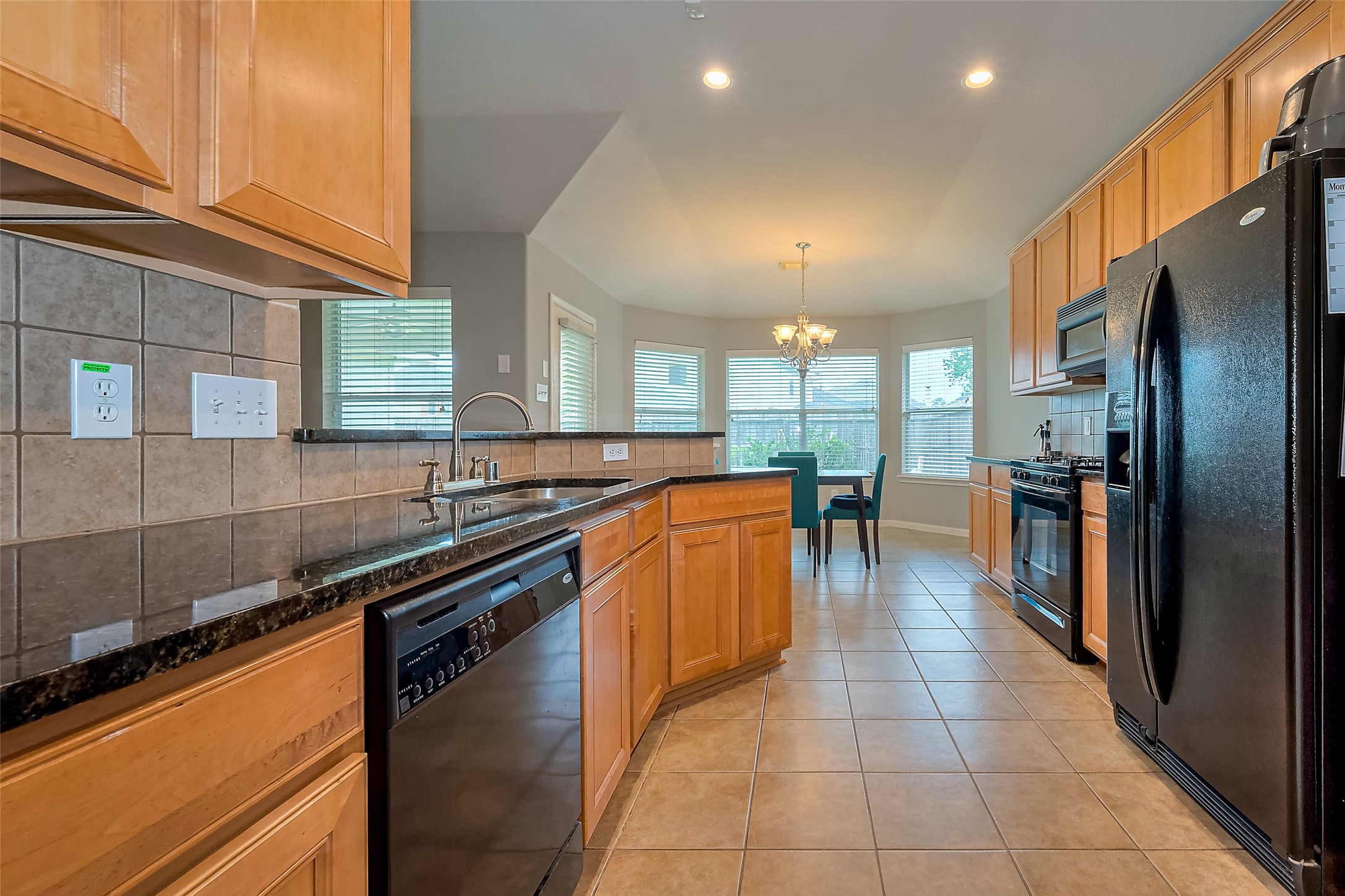 1007 Casting Springs Way Spring, TX 77373 - Photo 5 of 43 a large kitchen with stainless steel appliances lots of counter top space