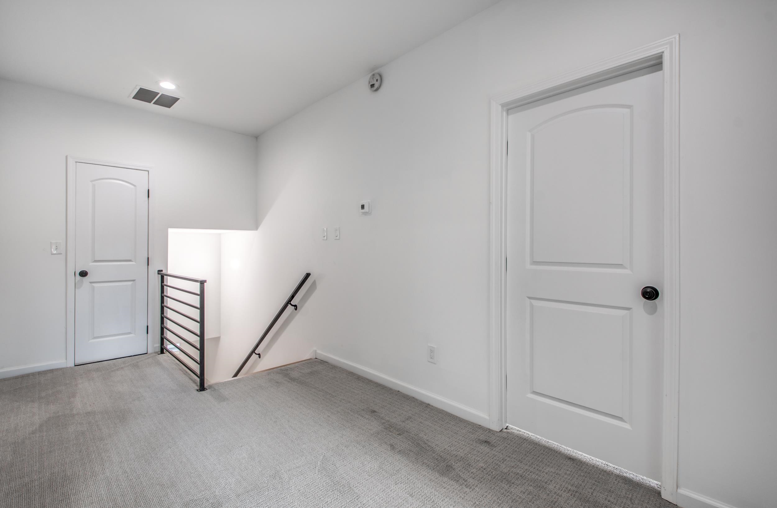 1781 Forest Avenue Memphis, TN 38112 - Photo 10 of 30 Carpeted empty room featuring baseboards