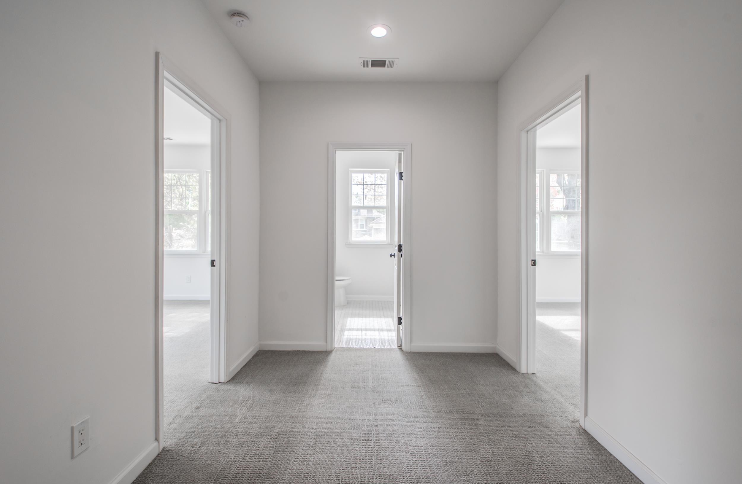 1781 Forest Avenue Memphis, TN 38112 - Photo 11 of 30 Entryway with light carpet, plenty of natural light, and recessed lighting
