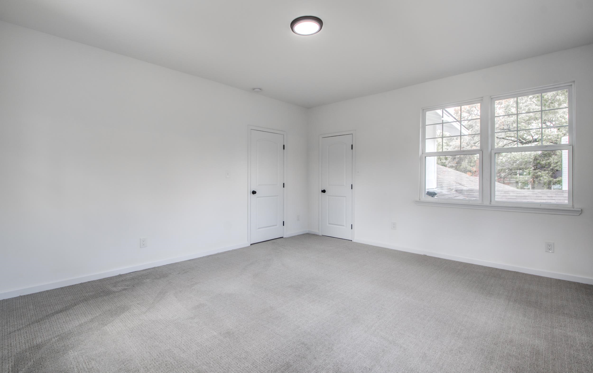 1781 Forest Avenue Memphis, TN 38112 - Photo 15 of 30 Carpeted spare room with baseboards