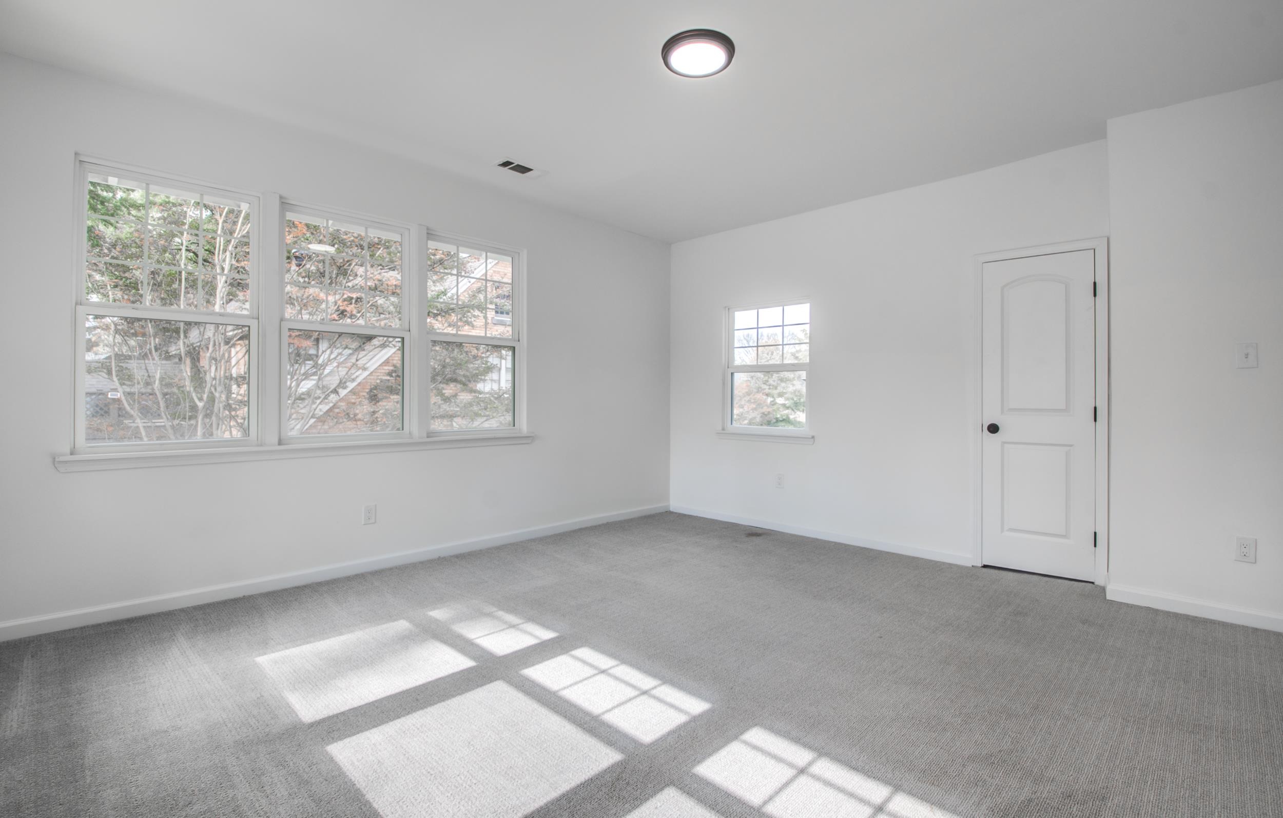 1781 Forest Avenue Memphis, TN 38112 - Photo 18 of 30 Carpeted empty room featuring baseboards