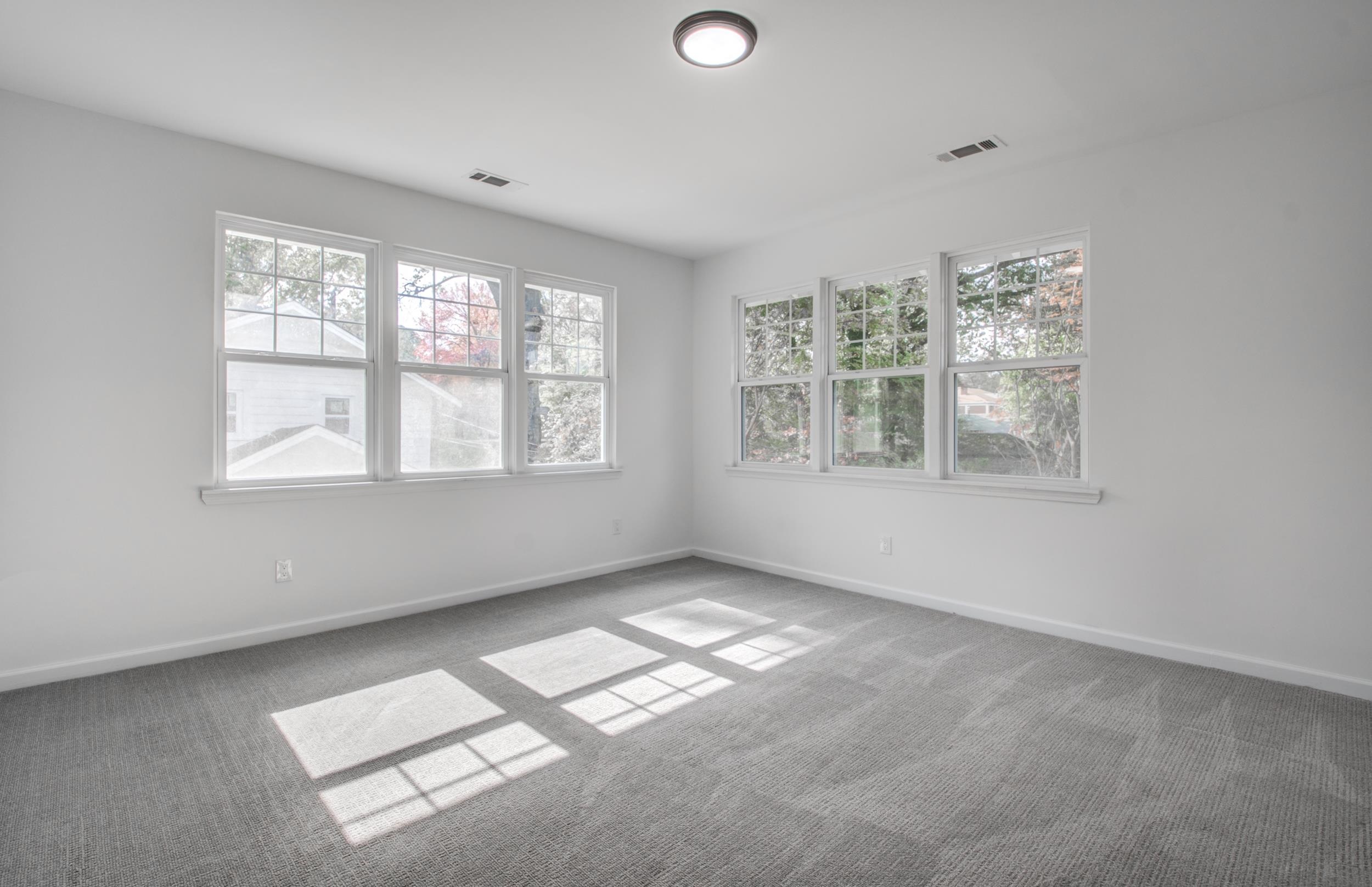 1781 Forest Avenue Memphis, TN 38112 - Photo 19 of 30 Unfurnished room with plenty of natural light and carpet floors