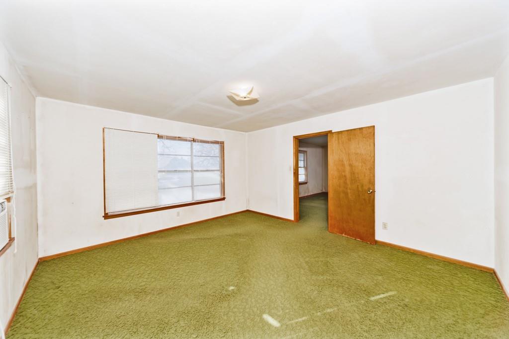 449 Olde Towne Road Paradise, TX 76073 - Photo 11 of 23 wooden floor in an empty room
