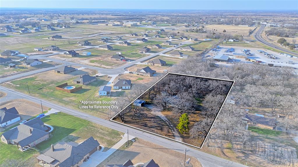 449 Olde Towne Road Paradise, TX 76073 - Photo 2 of 23 an aerial view of residential houses with outdoor space