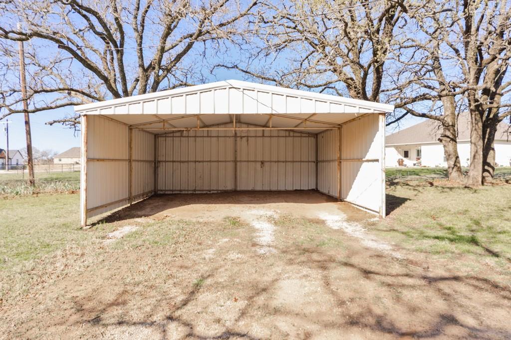 449 Olde Towne Road Paradise, TX 76073 - Photo 21 of 23 a view of a backyard
