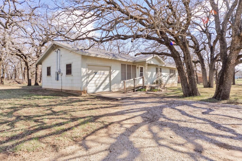 449 Olde Towne Road Paradise, TX 76073 - Photo 22 of 23 a view of a house with snow on the wall