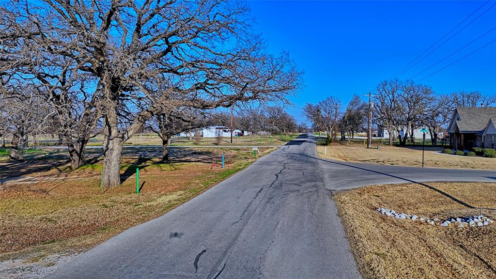 449 Olde Towne Road Paradise, TX 76073 - Photo 3 of 23 a view of a yard with swimming pool