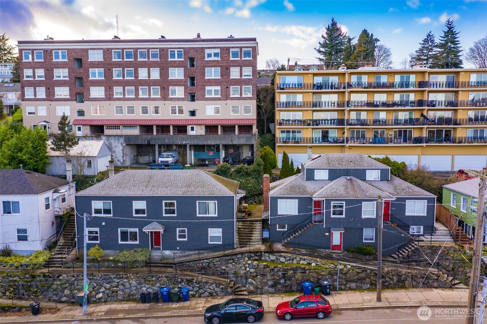 1809 5th Avenue North Seattle, WA 98109 - Photo 2 of 25 a front view of a building with garden