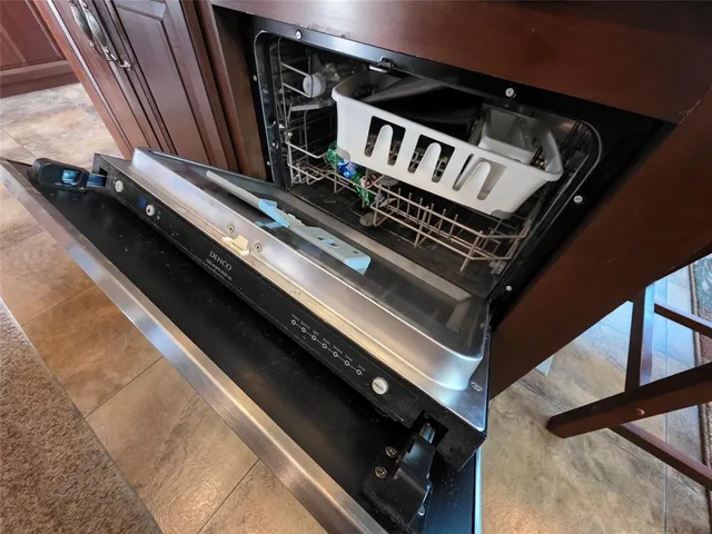 a bedroom with a bed and a mirror