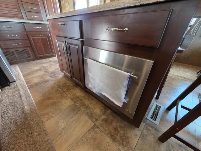 a view of hallway with wooden floor