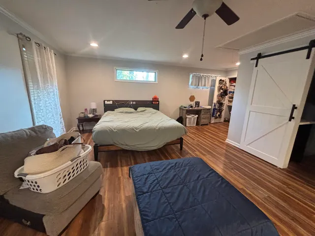 a bathroom with a sink vanity and mirror