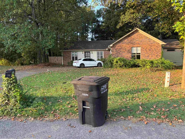 a bathroom with a sink toilet and mirror