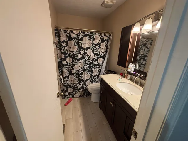 a house view with a garden space