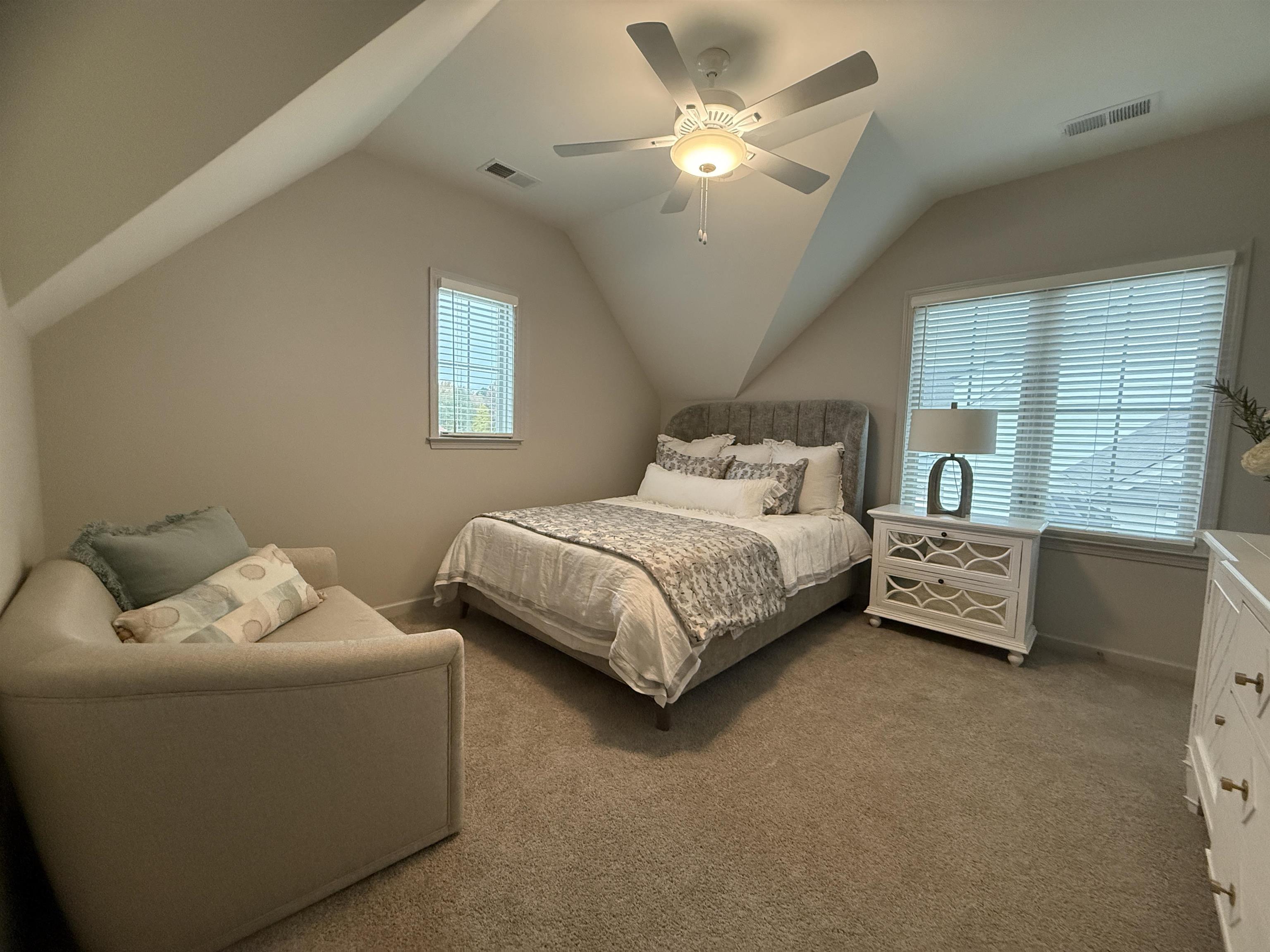 11516 Sunsparkler Way Collierville, TN 38017 - Photo 17 of 24 Carpeted bedroom with vaulted ceiling and ceiling fan