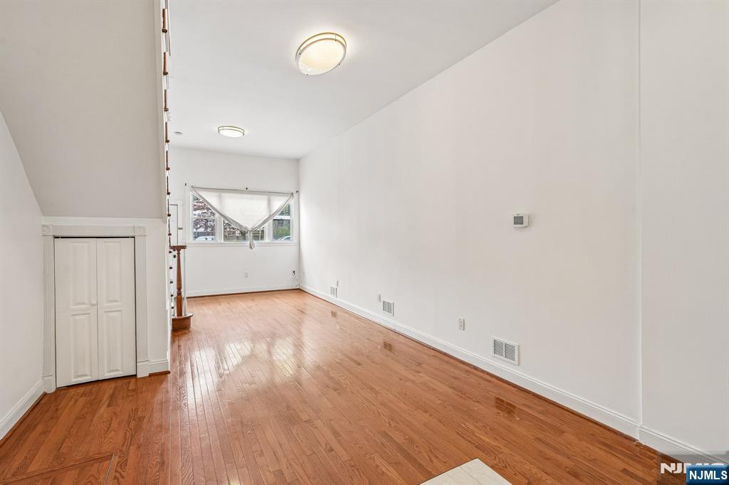 90 A Hackensack Plank Road Weehawken, NJ 07086 - Photo 9 of 40 a view of empty room with wooden floor