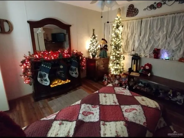 a living room with furniture and flowers