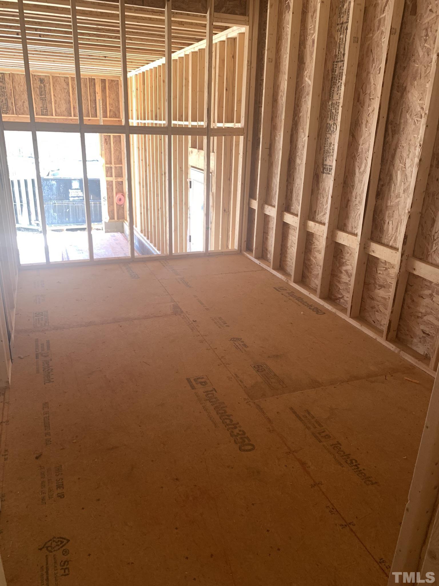 178 Dereham Lane Garner, NC 27529 - Photo 13 of 24 a view of an empty room with a window