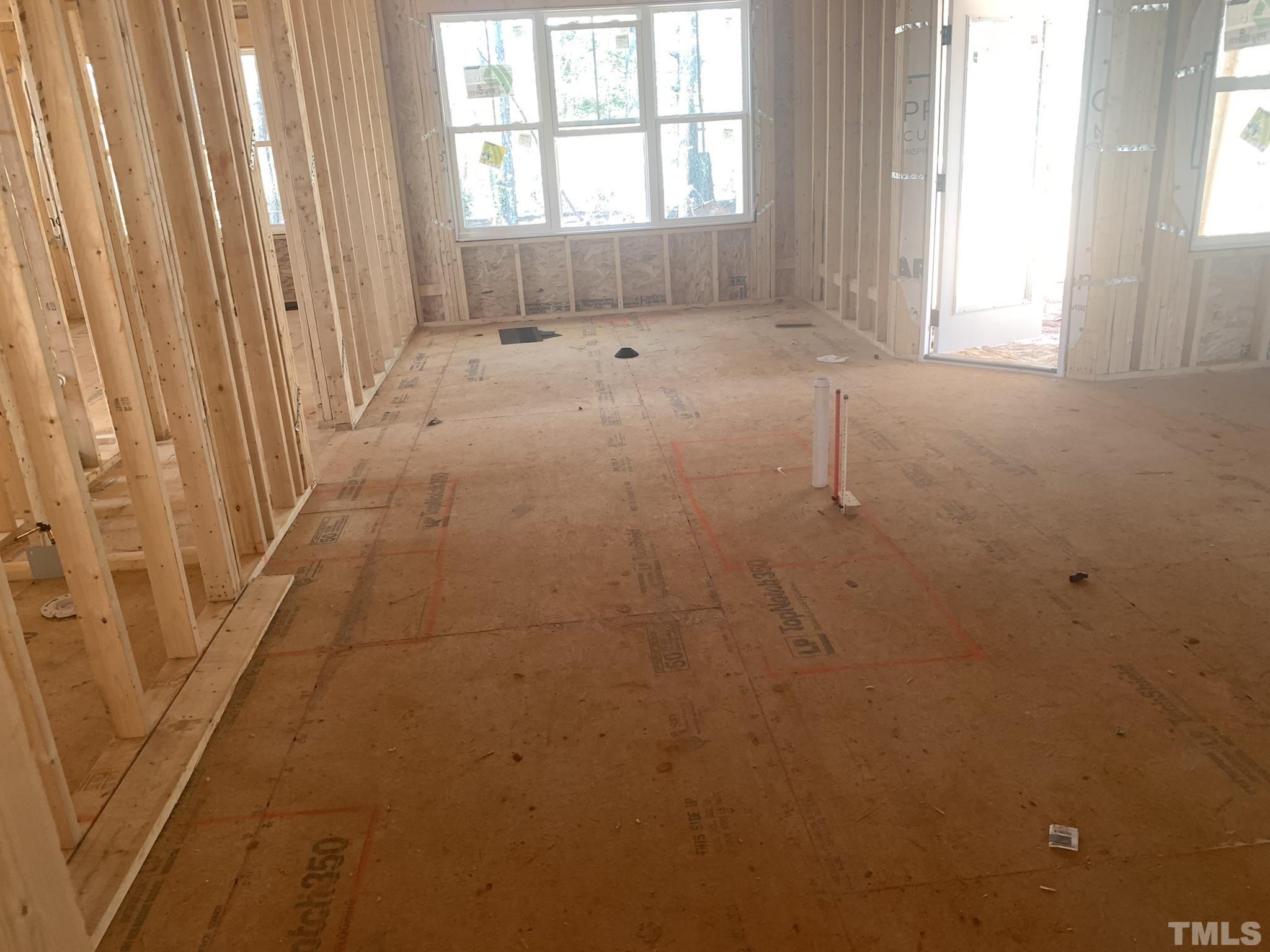 178 Dereham Lane Garner, NC 27529 - Photo 16 of 24 a view of an empty room with a window