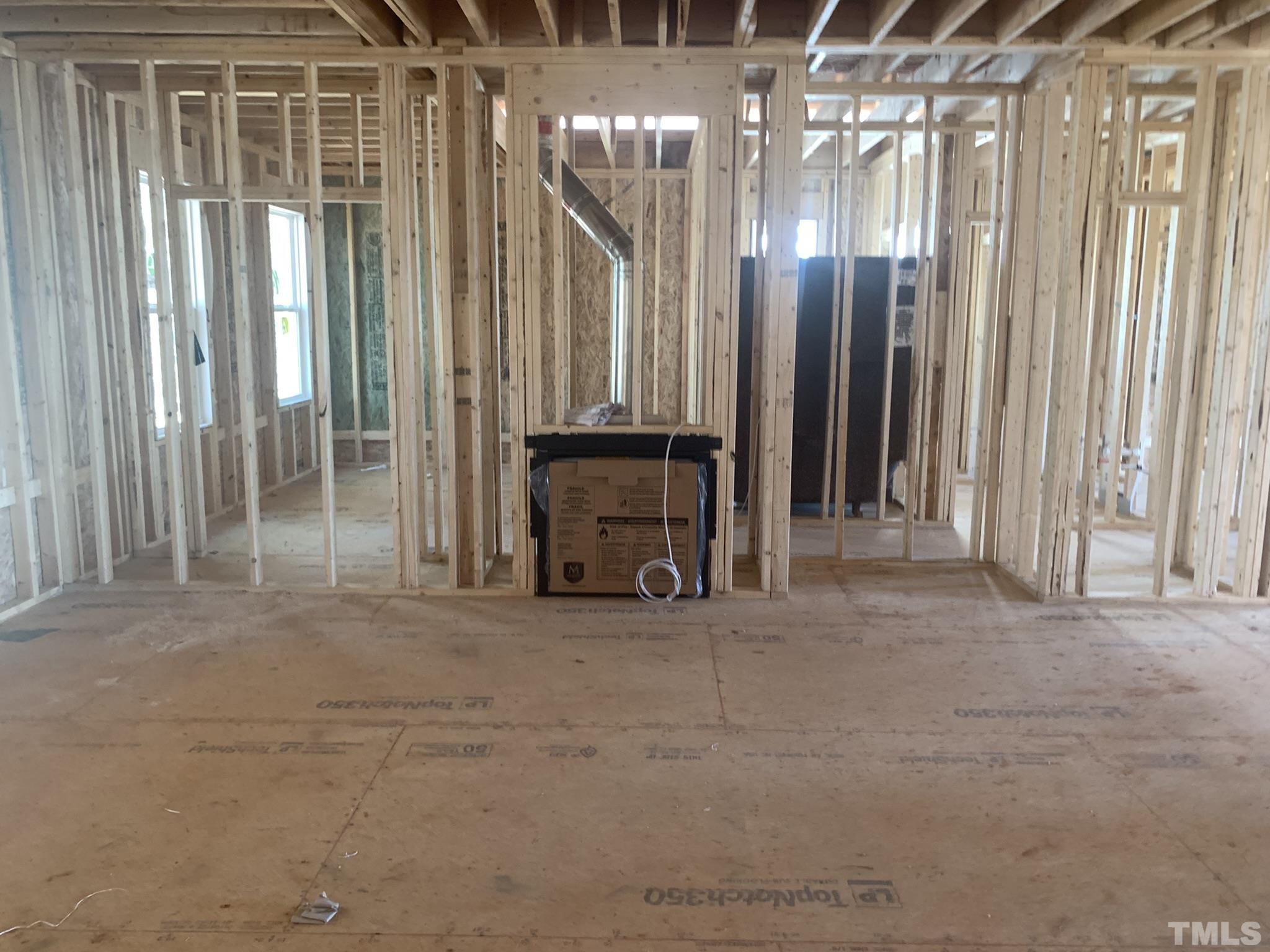 178 Dereham Lane Garner, NC 27529 - Photo 18 of 24 a view of a room with large windows and furniture