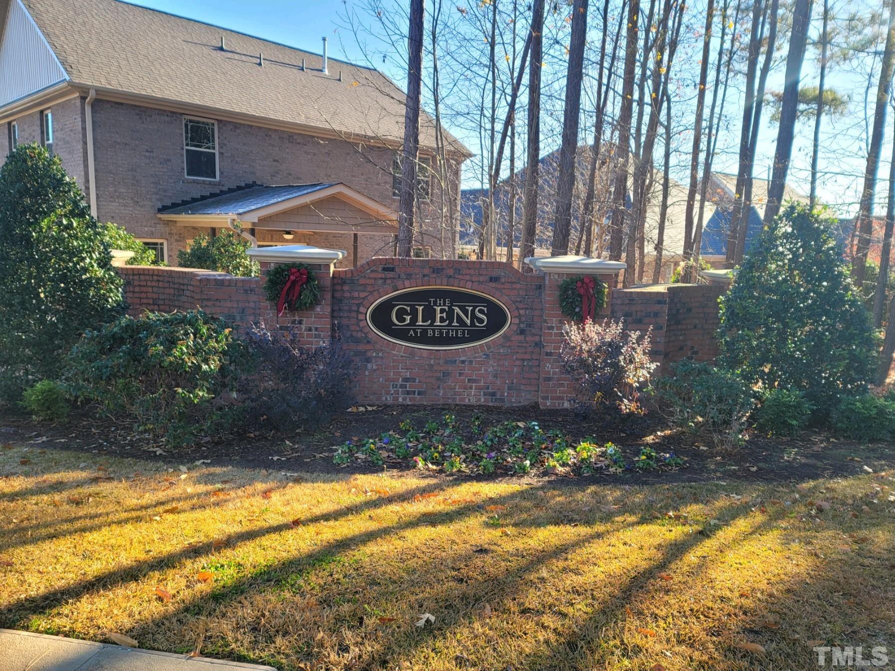 178 Dereham Lane Garner, NC 27529 - Photo 4 of 24 a sign that is on the side of a building