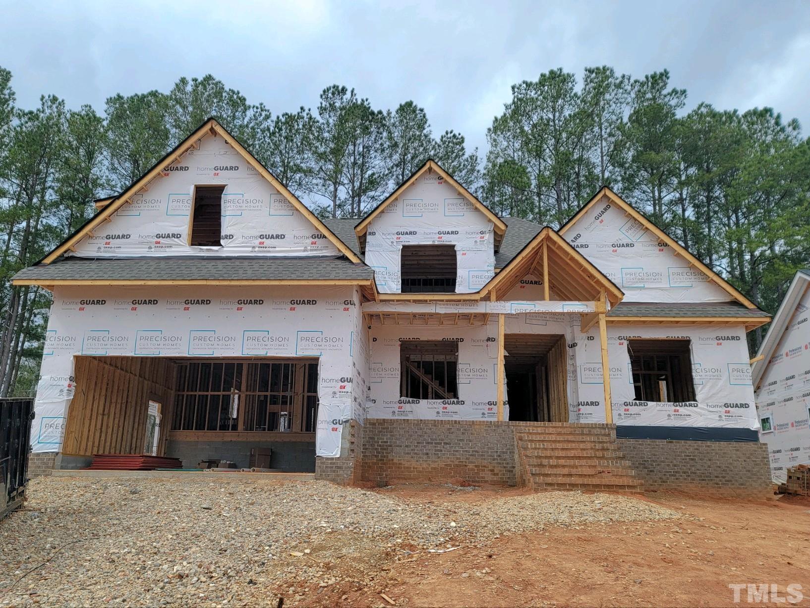 178 Dereham Lane Garner, NC 27529 - Photo 5 of 24 a front view of a house with a yard