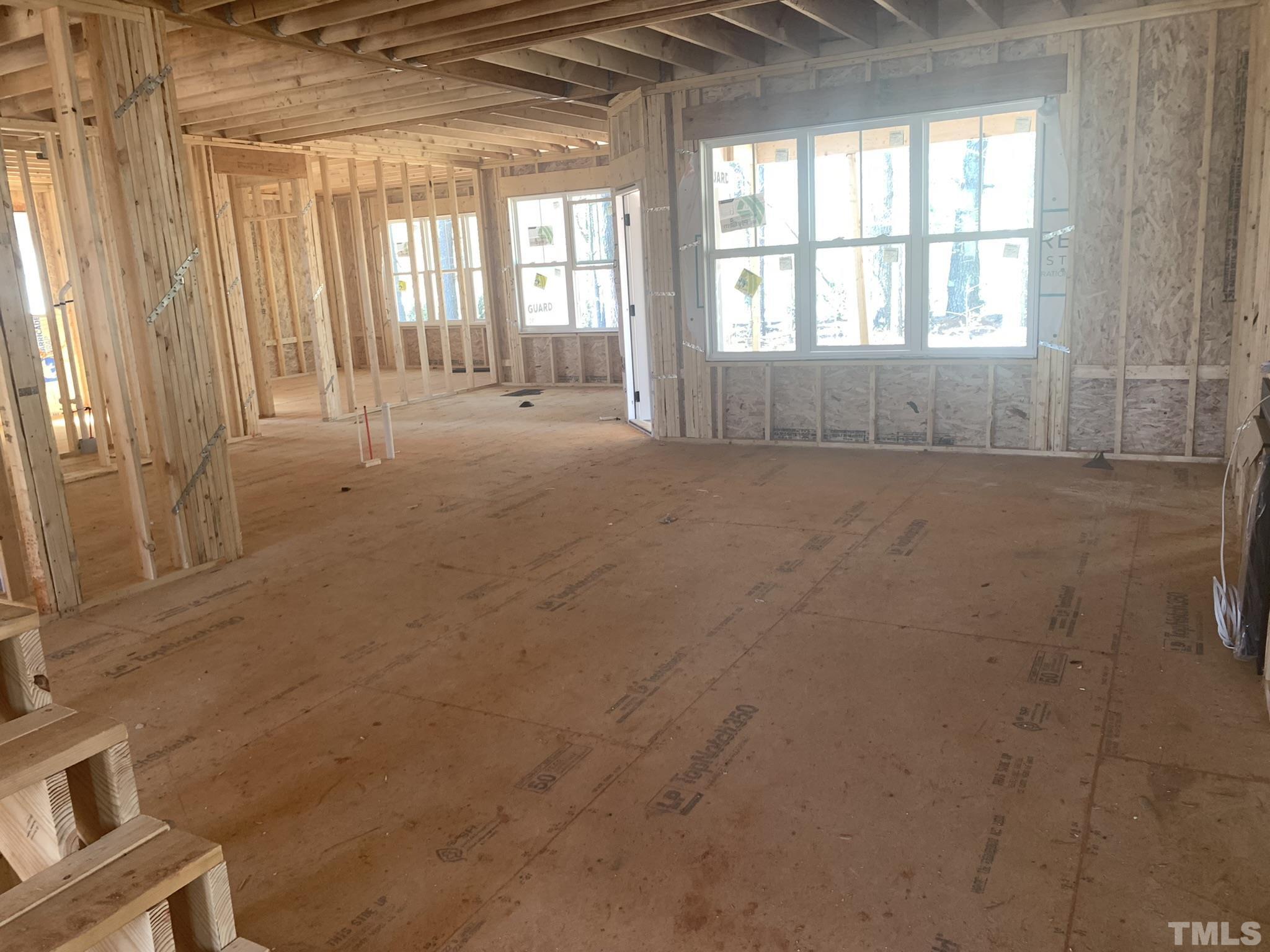 178 Dereham Lane Garner, NC 27529 - Photo 9 of 24 a view of an empty room with a window