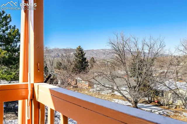 a bed room with a bed and a table