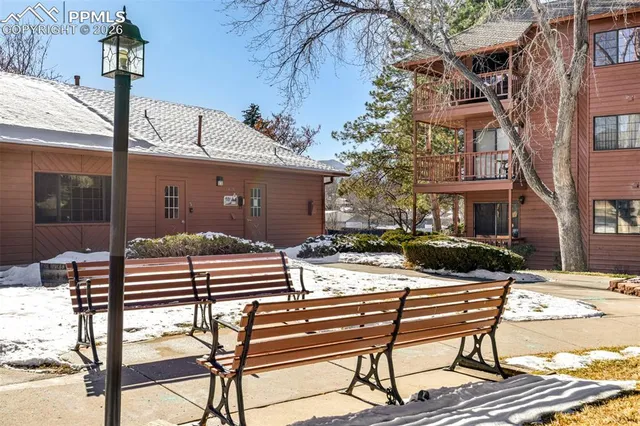 a view of a swimming pool with a patio
