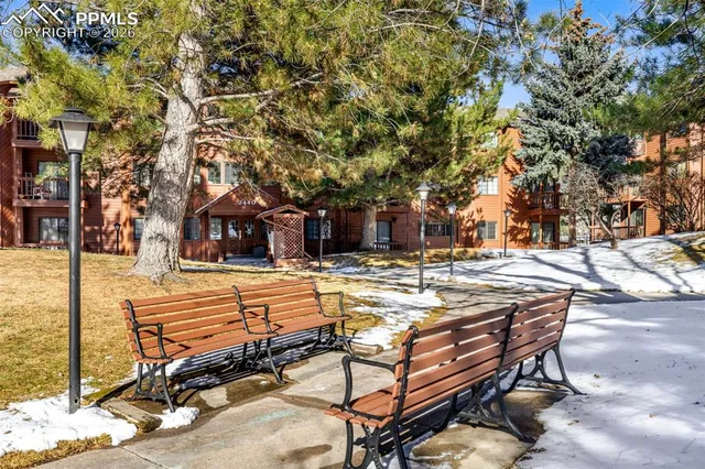 a view of a swimming pool with an outdoor space