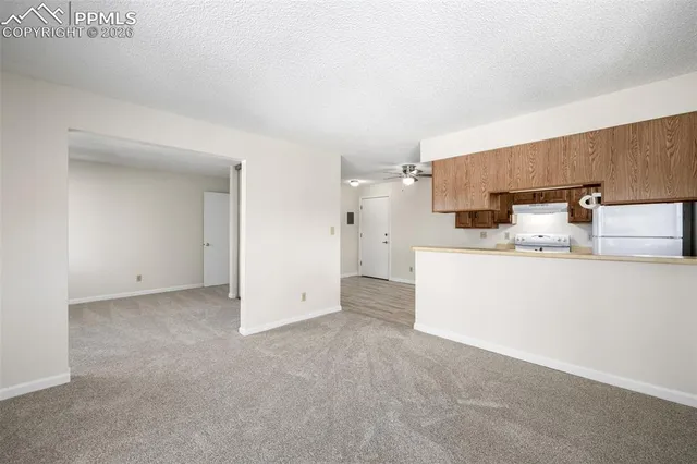 a view of a kitchen with a sink
