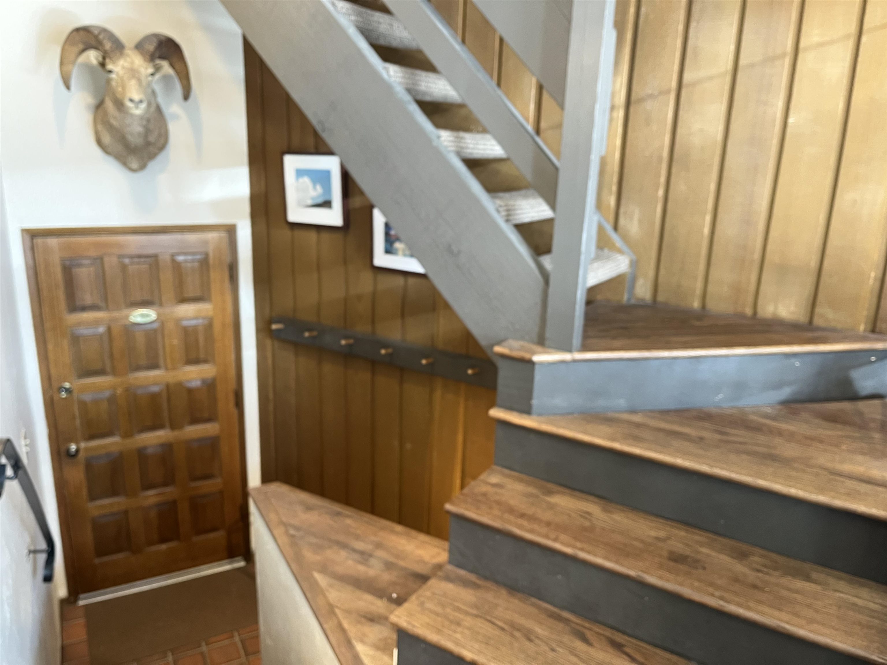 286 Old Mammoth Road, Unit 7 Mammoth Lakes, CA 93546 - Photo 13 of 32 Staircase with wooden walls