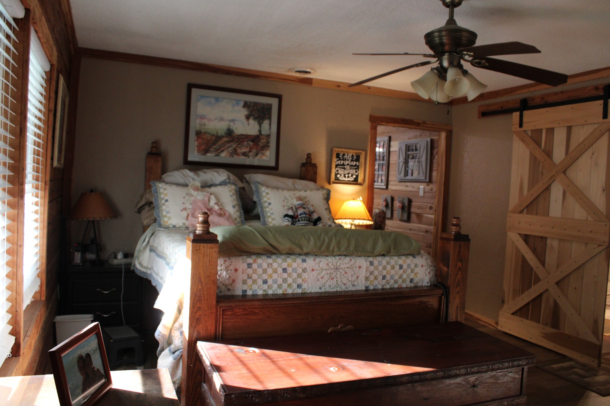 529 Napier Road Lawrenceburg, TN 38464 - Photo 14 of 60 a bed room with a bed mirror and a night stand