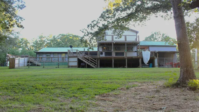 a kitchen with a sink cabinets and refrigerator