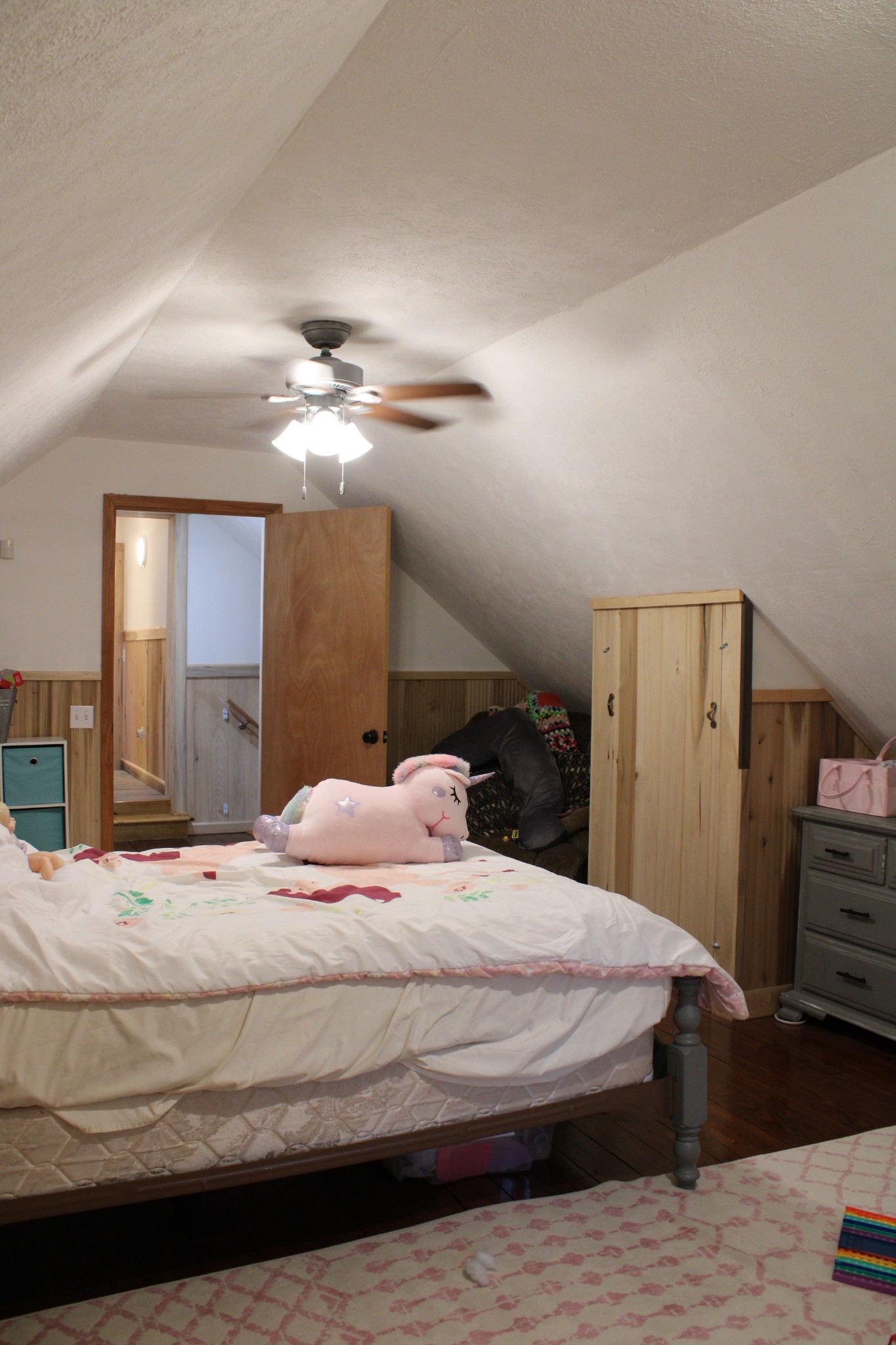 529 Napier Road Lawrenceburg, TN 38464 - Photo 33 of 60 a bedroom with a bed and a chandelier