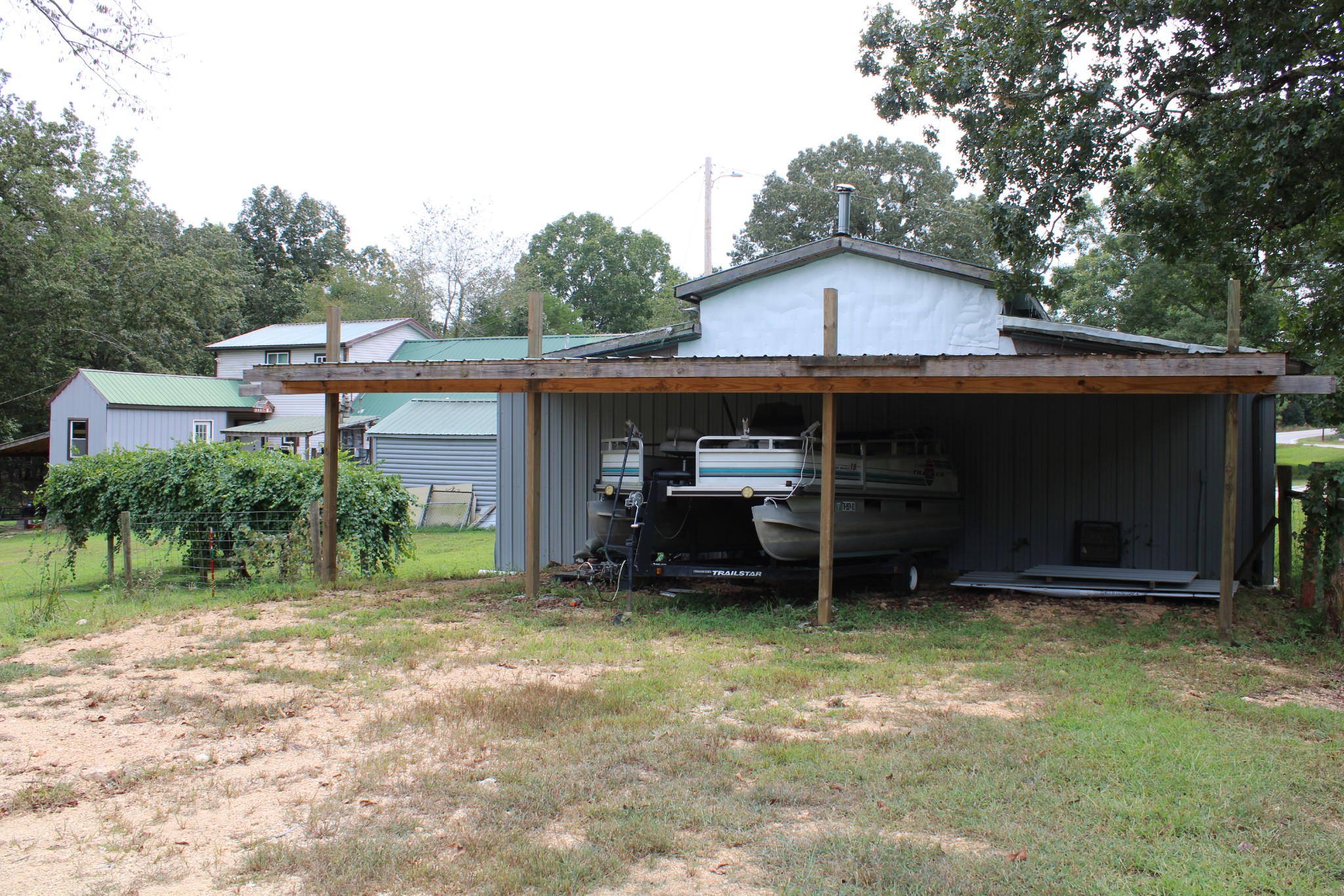 529 Napier Road Lawrenceburg, TN 38464 - Photo 53 of 60 a view of a house with a yard and a large tree