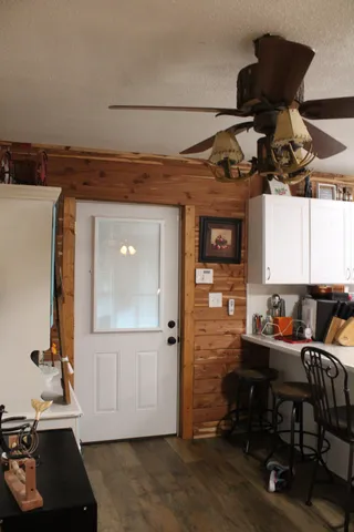 a bathroom with a shower and toilet