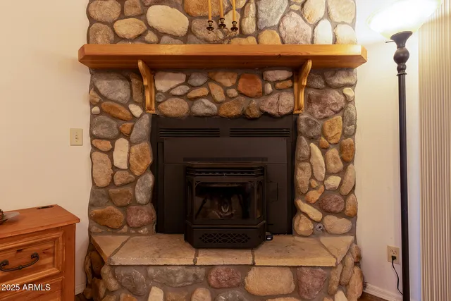 a living room with a fireplace