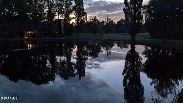a view of lake with green space