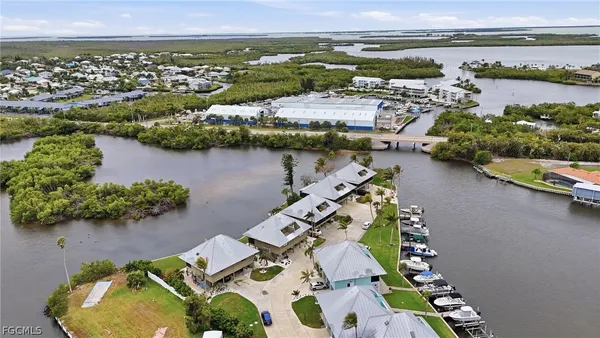 an aerial view of a house with outdoor space